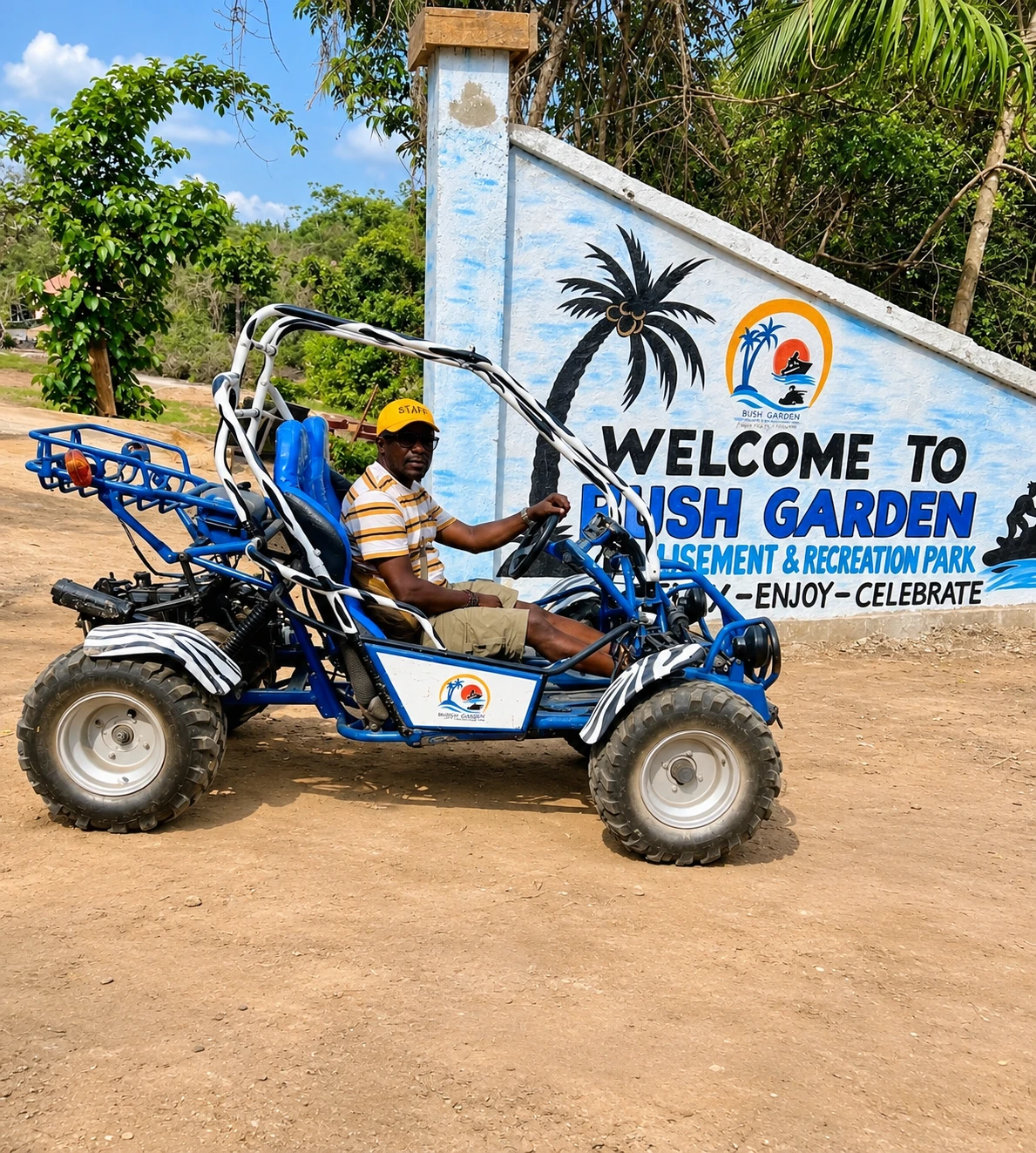 A visitor in a buggy at the Bush Garden entrance