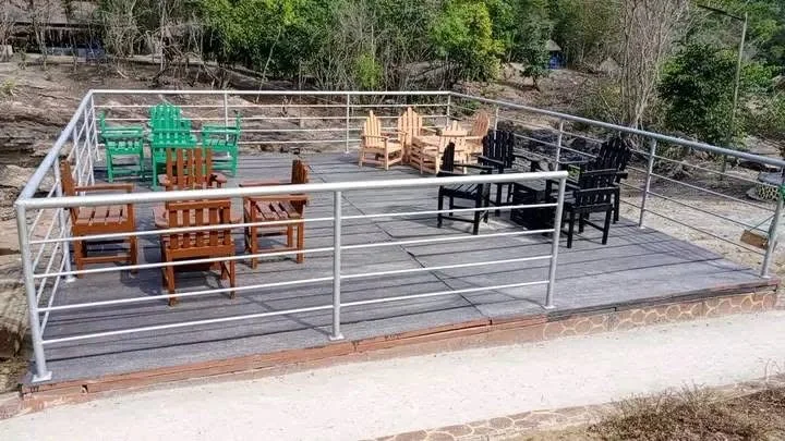 Seating on a deck under trees